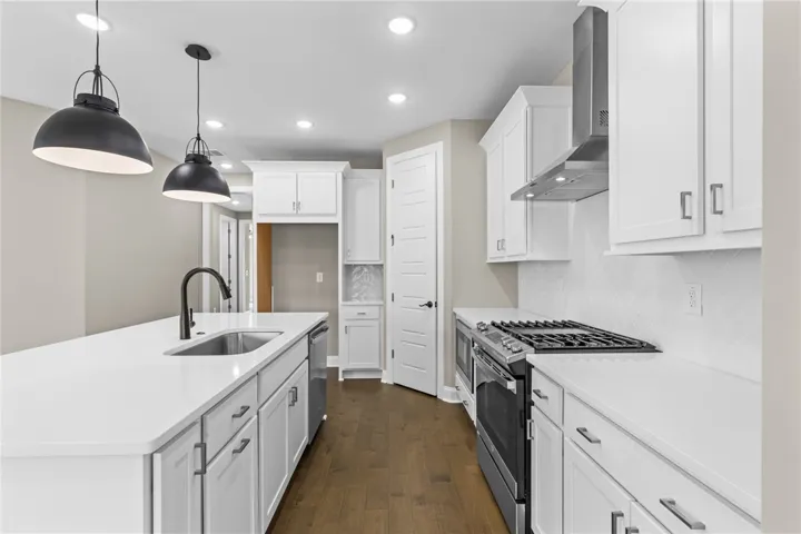 This sleek kitchen features clean lines and contemporary finishes.