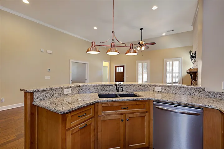 Kitchen looks out into the Great Room