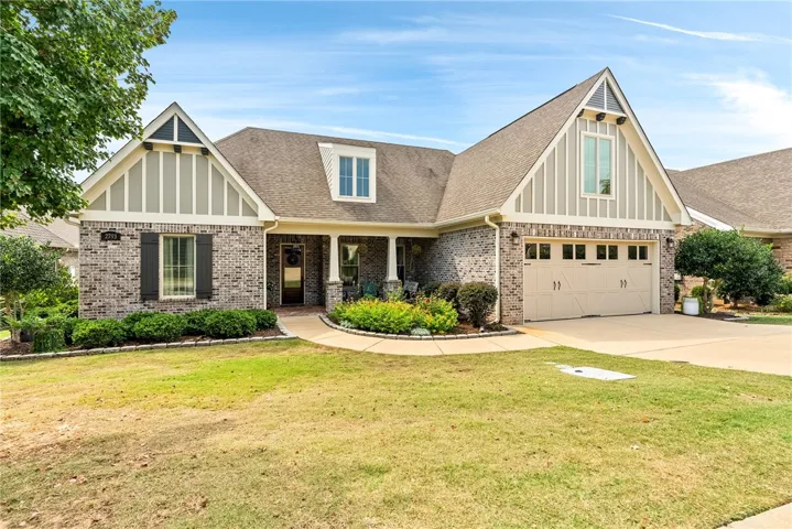 Charming front facade with Tudor cottage influence