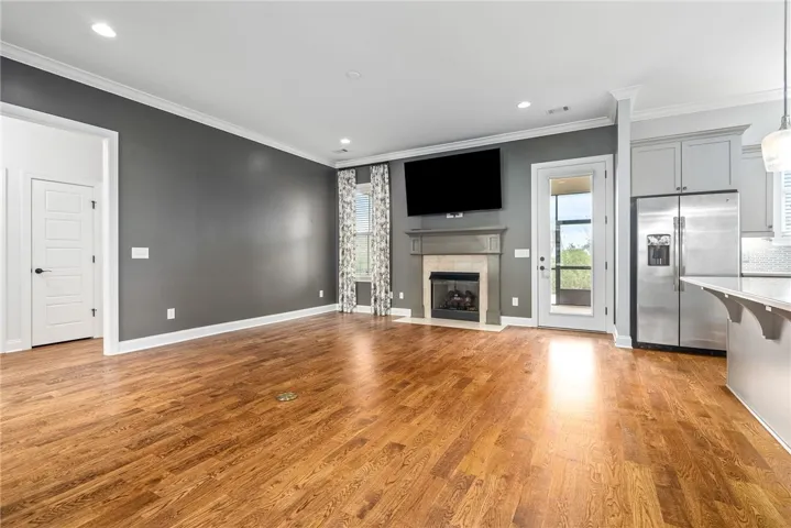 large living with genuine sanded wood floors