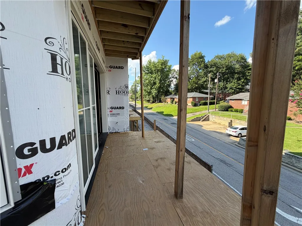 A promising new construction offers ample outdoor space overlooking a quiet street.