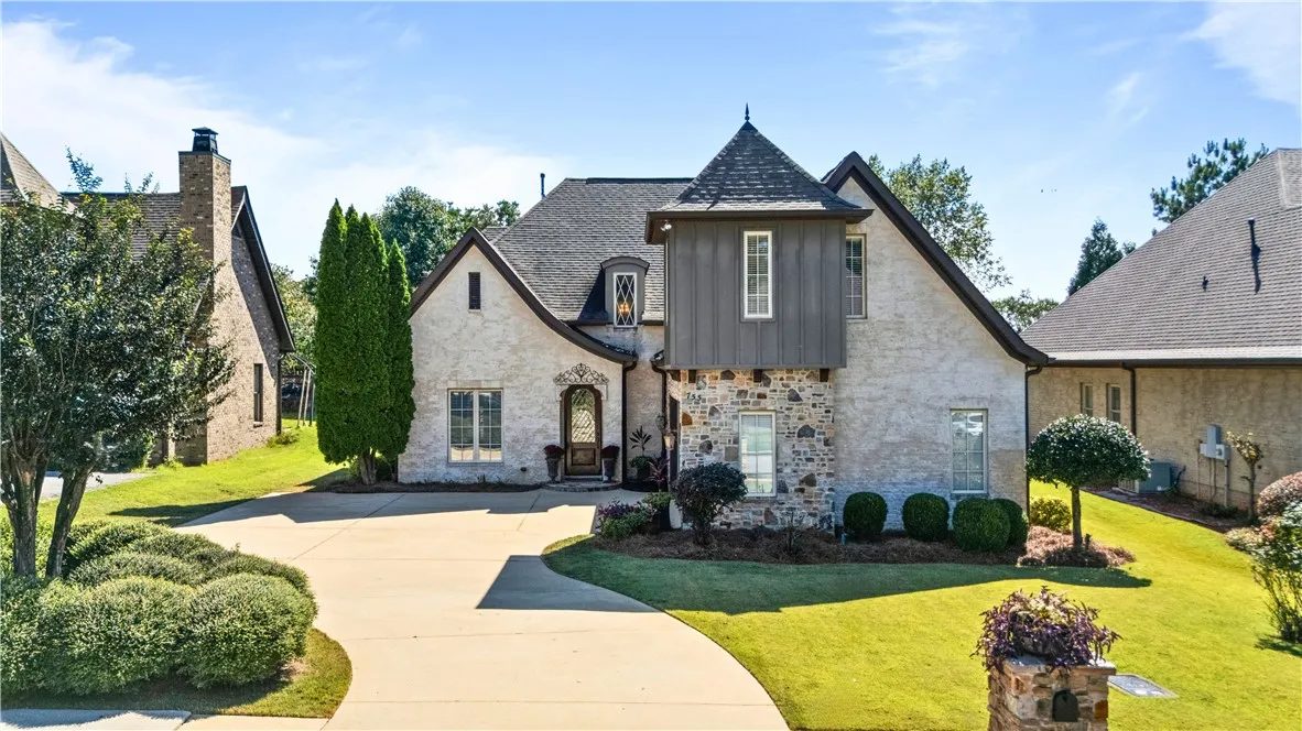 Exterior with stone, brick wood and accents