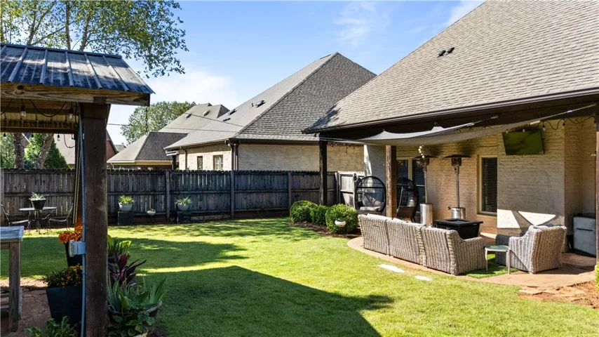 Covered Rear Patio with firepit and furniture