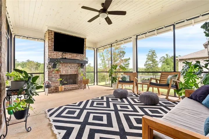 Amazing screened in porch with fireplace