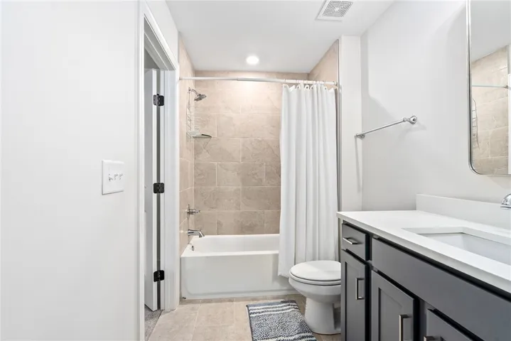 Upstairs bonus bedroom with en suite bathroom
