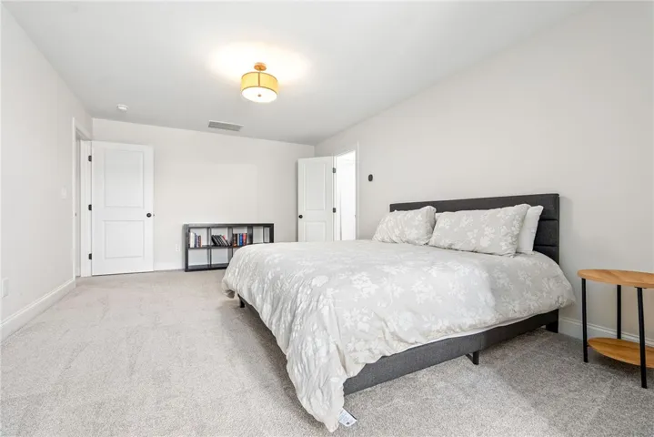 Upstairs bonus bedroom with en suite bathroom