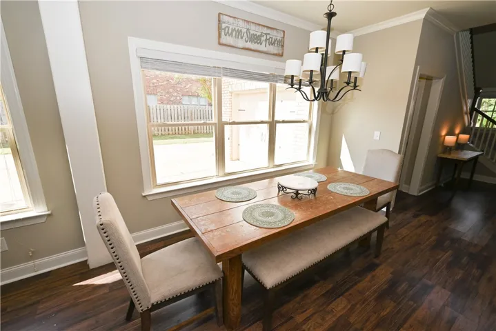 Dining area with room for 8 overlooking the fun courtyard.