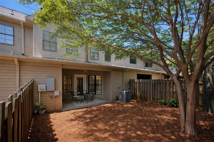 An inviting private patio awaits, perfect for outdoor relaxation and quiet enjoyment.