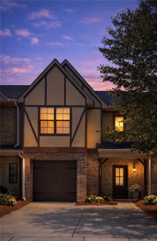 This charming townhome offers inviting curb appeal and a convenient attached garage.