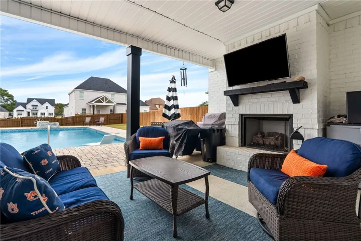 LARGE covered patio with fireplace