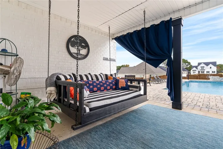 Day swing under covered patio remains