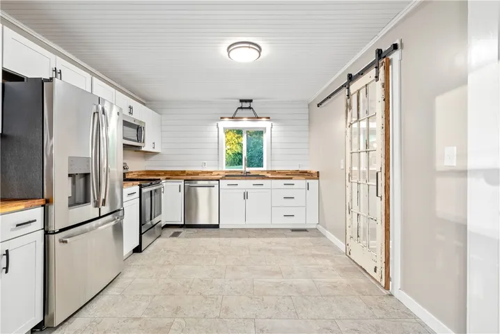 Open kitchen with ALL appliances