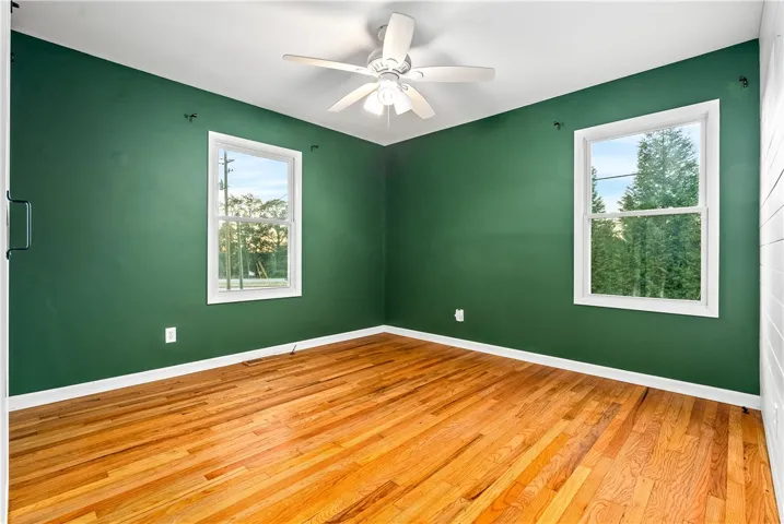 2nd bedroom with built-in bookshelves and generous closet