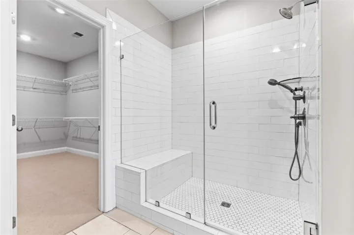 Super size tiled shower in the primary bath