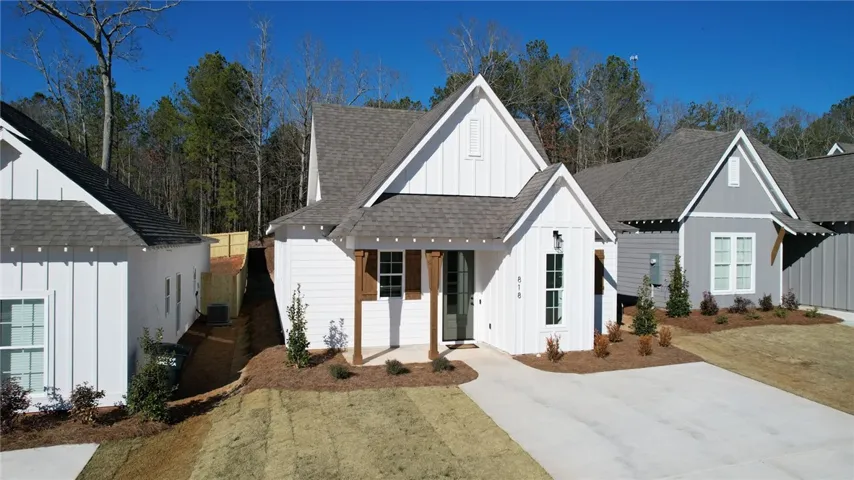 The Telford plan by Holland Homes LLC. This is a previously built home and is not the subject property.
