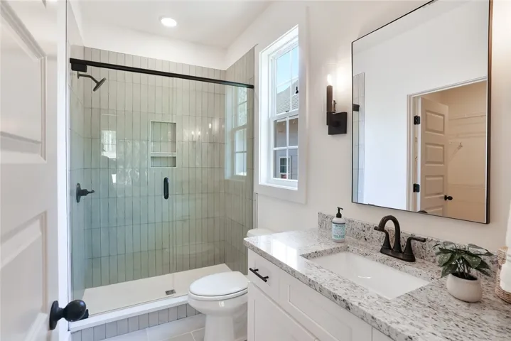 The Telford plan by Holland Homes LLC. This is a previously built home and is not the subject property.