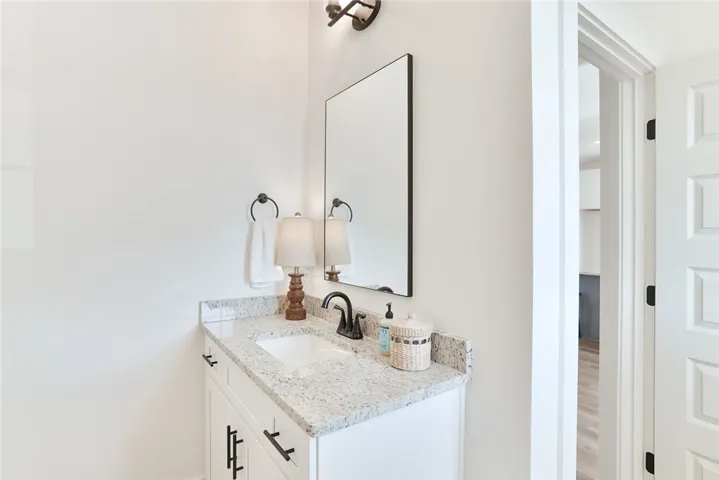 The Telford plan by Holland Homes LLC. This is a previously built home and is not the subject property.