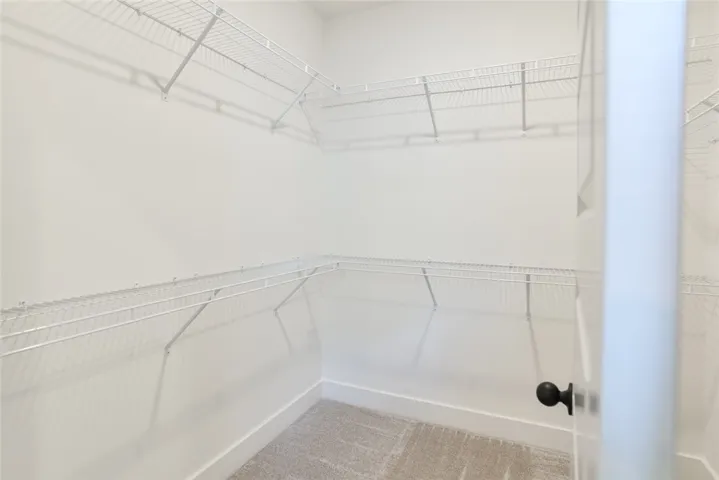 The Telford plan by Holland Homes LLC. This is a previously built home and is not the subject property.