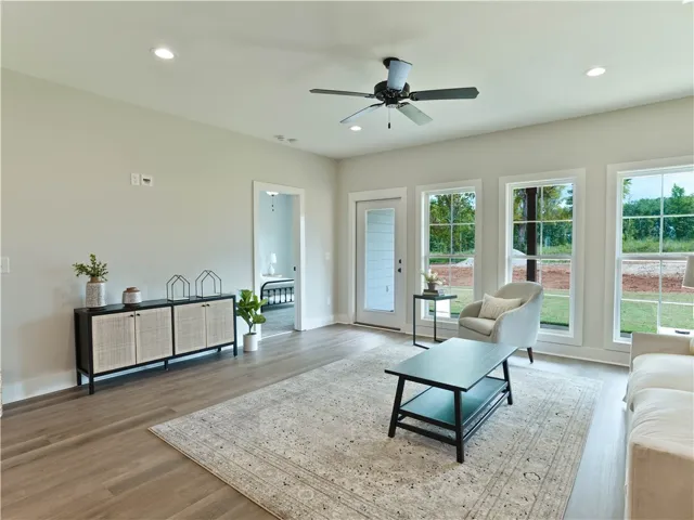 Living Area with 9ft ceilings - Blinds will be included - example of a completed Torbert Plan