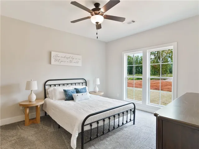 Primary Bedroom with lots of Natural Light - example of a completed Torbert Plan
