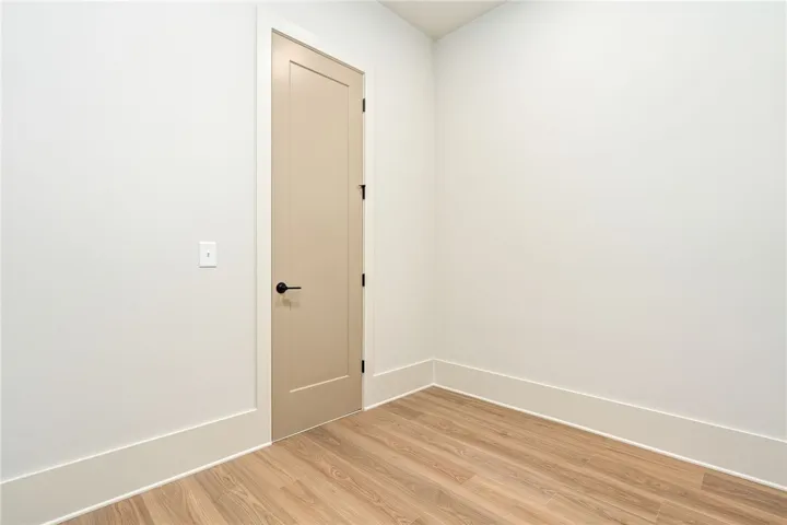 This versatile room offers endless possibilities, perfect for a dedicated home office or cozy retreat.