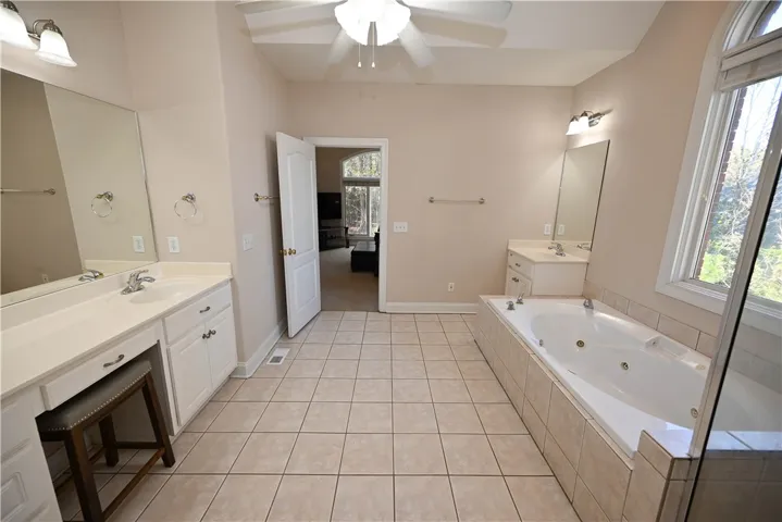 Double vanities, one with a dressing table.