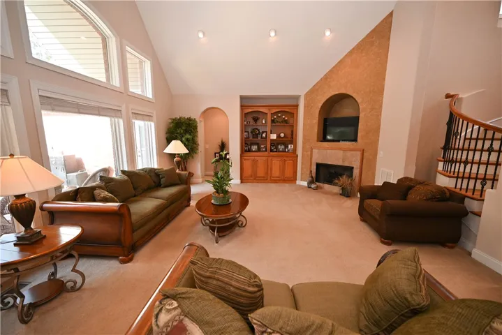 Huge great room with soaring ceilings and exapansive windows.