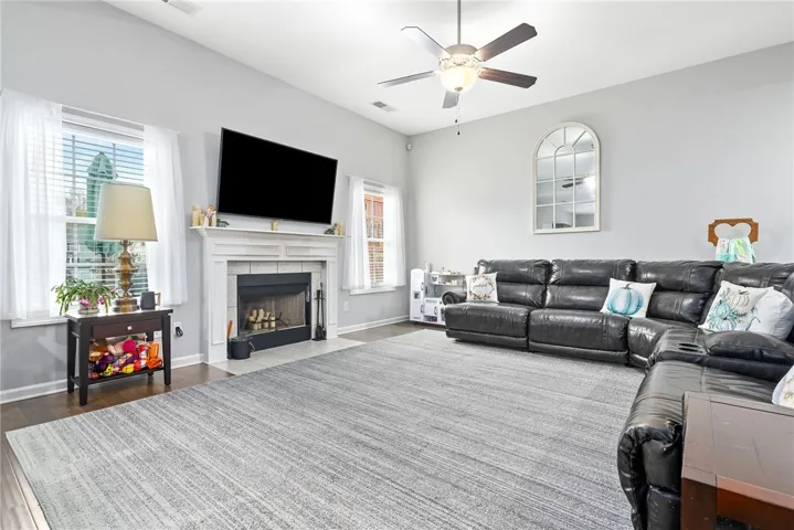 Spacious living room with wood burning fireplace