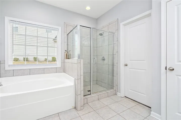 Soaking Tub and Walk In Shower in Primary Bath