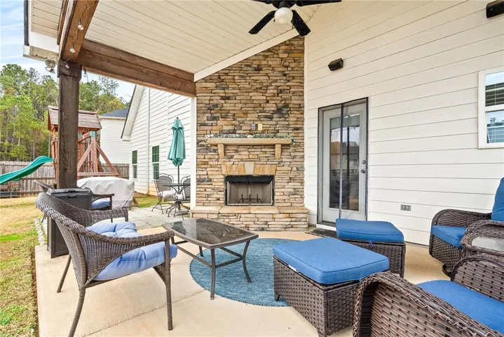 Gameday patio complete with wood burning fireplace