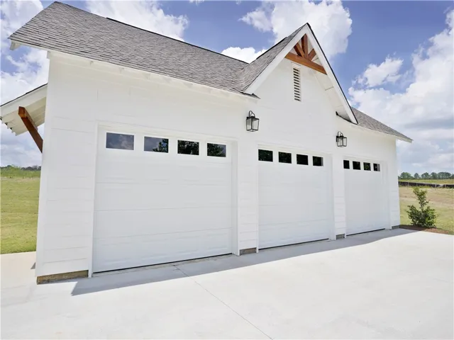 Detached 3 car garage included.