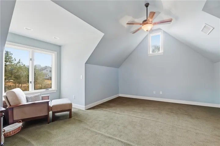 Upstairs bonus room. Bonus room is very large and could be an office, guest retreat with table and couch or a bedroom.