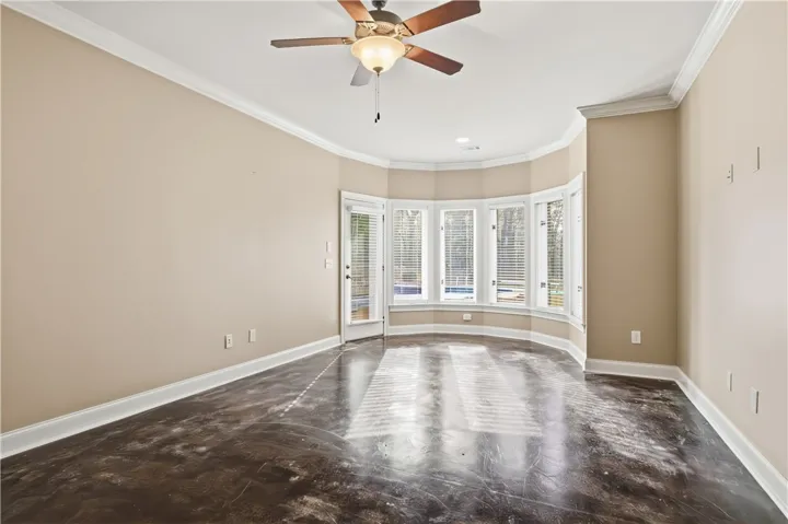 Downstairs bedroom with pool deck access