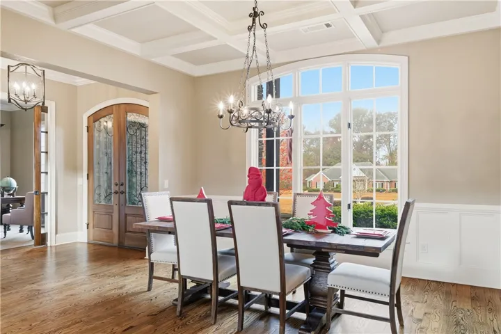 Formal Dining room with coffered ceiling