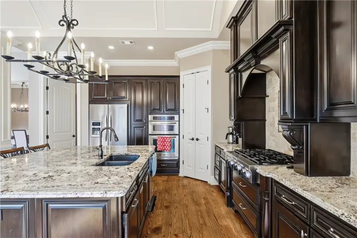 Kitchen with an abundance of cabinetry and pantry