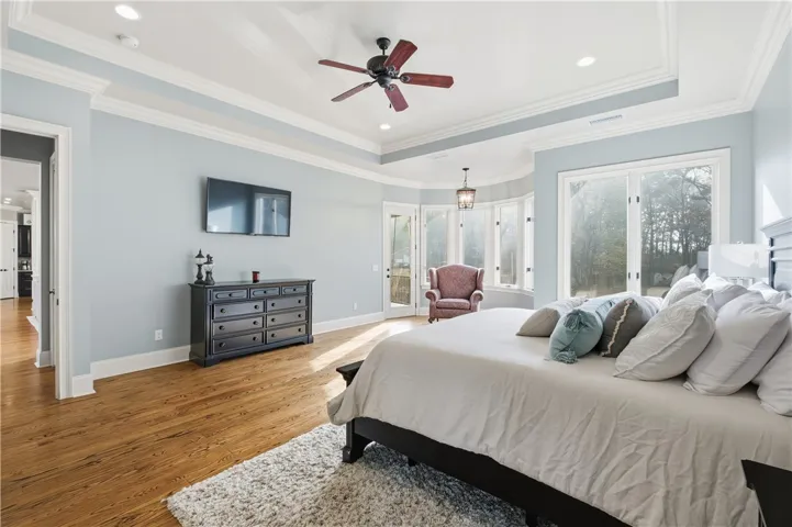 Primary suite that has tinted windows for privacy and to keep the room cool