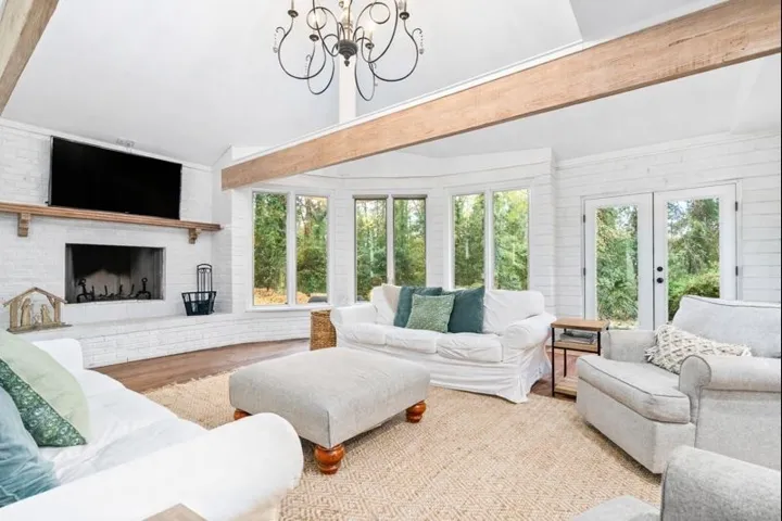 Living room with beamed accents