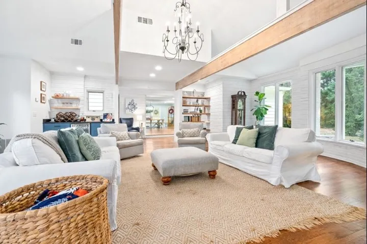 Living room with beamed accents