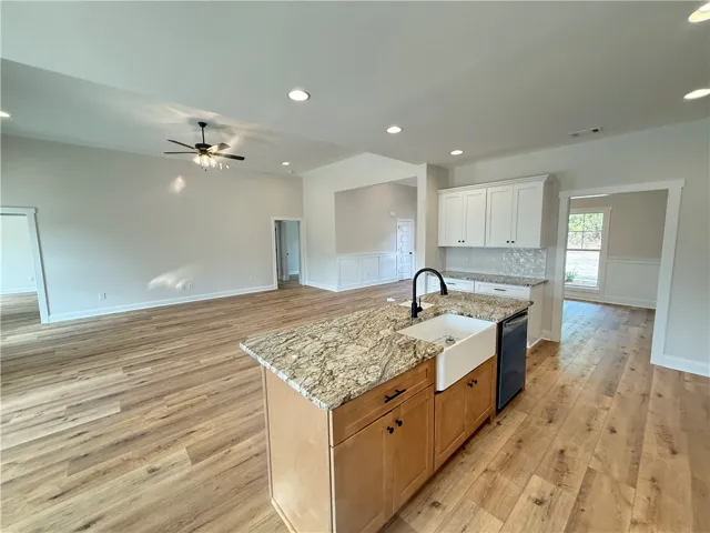 Kitchen looking into living room
