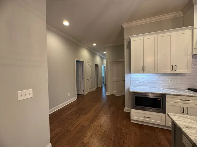 Entry hallway leading to kitchen