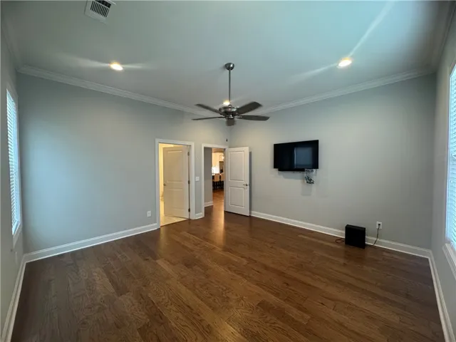 Interior primary bedroom/tv