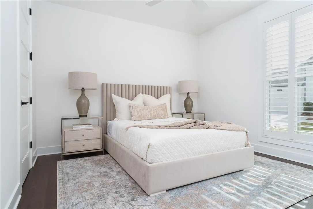 This bright and inviting bedroom offers comfort and a tranquil atmosphere. (photo of previous sale)