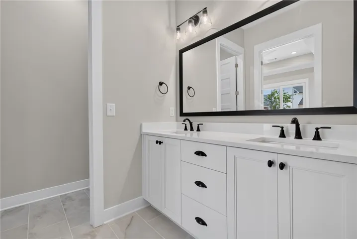 Primary bath with double vanity & water closet