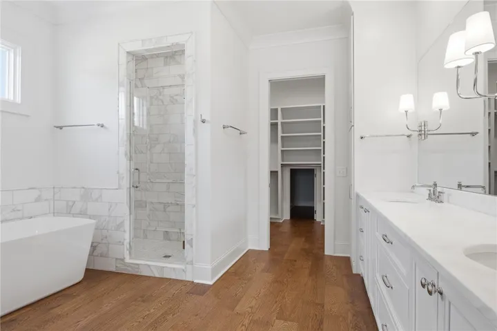 You Will Love The Custom His/Her Vanity Spaces. Lots Of Storage For Toiletries, Towels, & So Much More! The Master Shower Is Outfitted With Beautiful Carrera Gold Marble.
