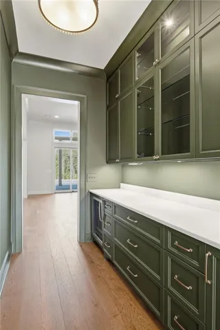  Strategically Placed Between The Kitchen & Dining Room, The Butler's Pantry Offers Extra Space for Special Dishes/Glass wares, or Your Favorite Drink Collection.
Show less