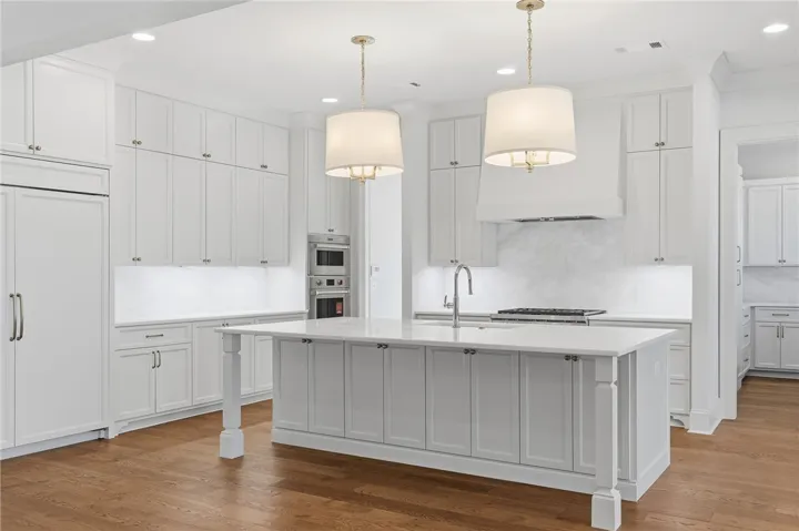 The Paneled Sub-Zero Appliances Flow Seamlessly With The Custom Cabinetry.