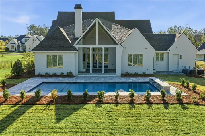 The Travertine Surround Envlopes The Gunite Pool & Are The Perfect Compliment To The Scuppers.