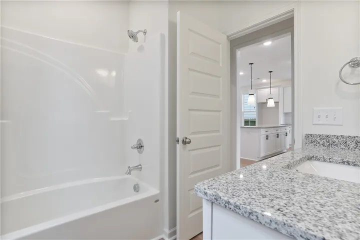 Move in Ready Tate plan on lot 128 by Holland Homes LLC.