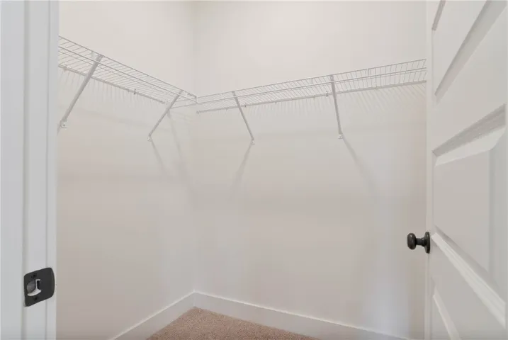 Walk-In Closet in Primary Bedroom