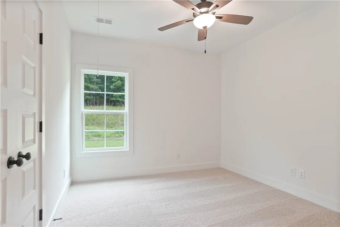 Not the subject property but is a similar variation of the plan shown here. All plans, pricing, and specifications are subject to change without notice.